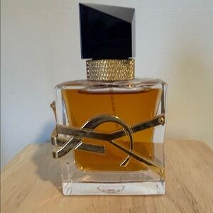 Yves Saint Laurent Gold and Black Perfume Bottle